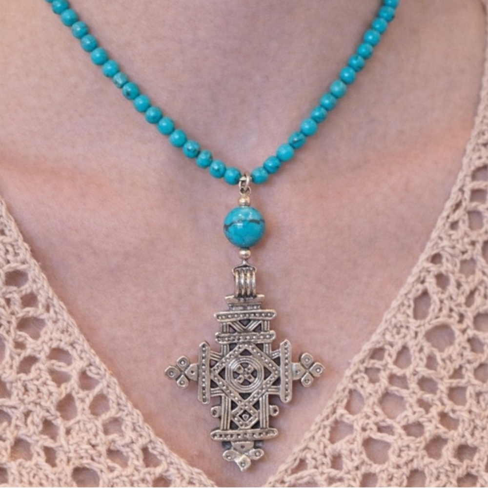 Turquoise beaded necklace with cross pendant